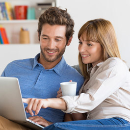 Young couple using tablet